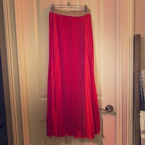 Red pleated maxi skirt by BCBG
